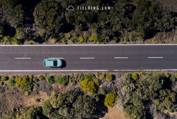 light blue car on a california highway