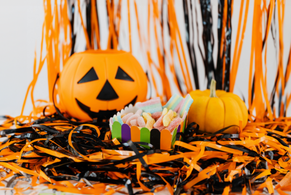 Jack-o-lantern with candy and streamers