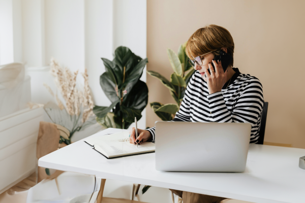 Woman on the phone seeking Insurance claims advice