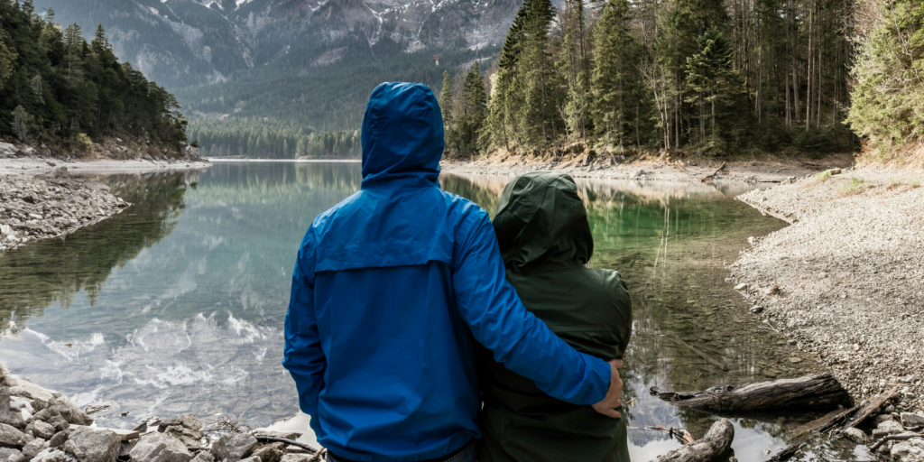 couple together at a lakes edge. Loss of Consortium