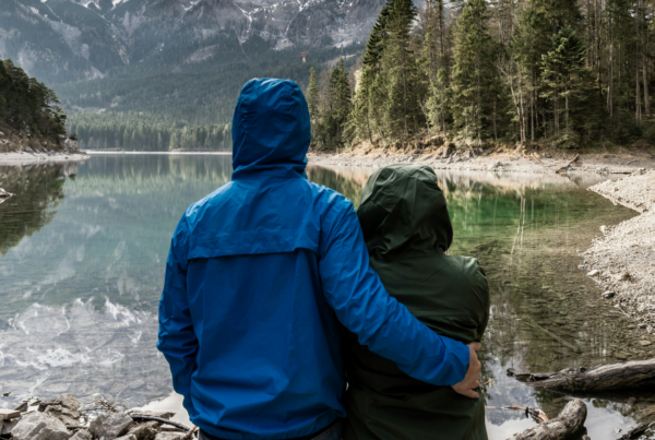 couple together at a lakes edge. Loss of Consortium