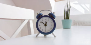 Clock on a table. Settling Your Personal Injury Claim