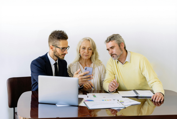 People discussing an insurance policy.