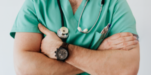 Hospital doctor with arms crossed