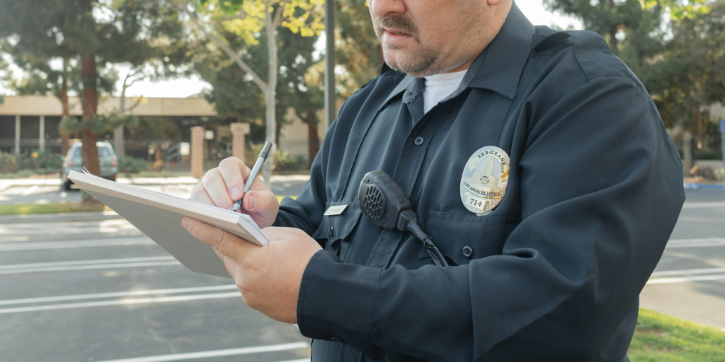 Police Officer making a report