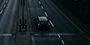 Solo car on a dar empty highway