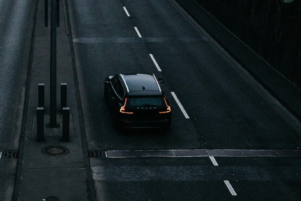 Solo car on a dar empty highway