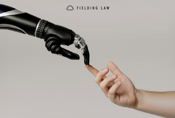 ai hand touching a human hand