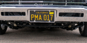 California license plate on the front of a car