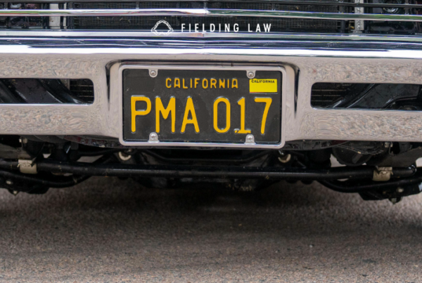California license plate on the front of a car