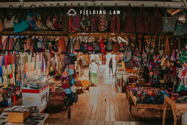 flea market with lots of clothing and trinkets