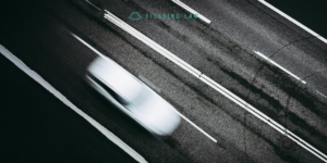 Aerial view of a car possibly fleeing after a hit and run