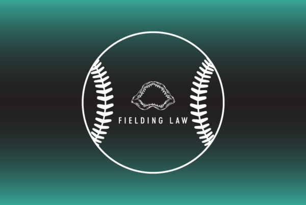 Fielding Law logo in a baseball outline