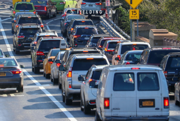 Multiple cars sitting in peak time of traffic trying to get off an exit ramp.