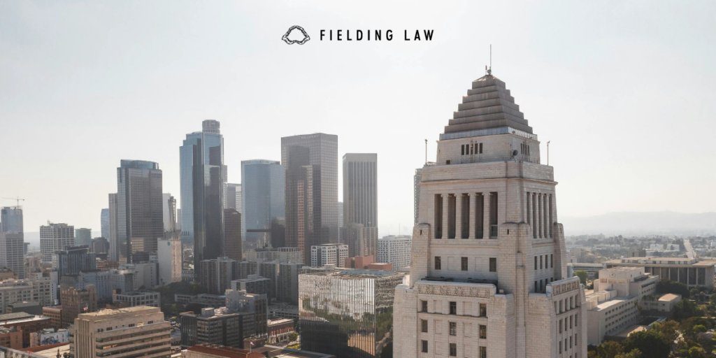 City of Los Angeles City Hall building with other city buildings in the background
