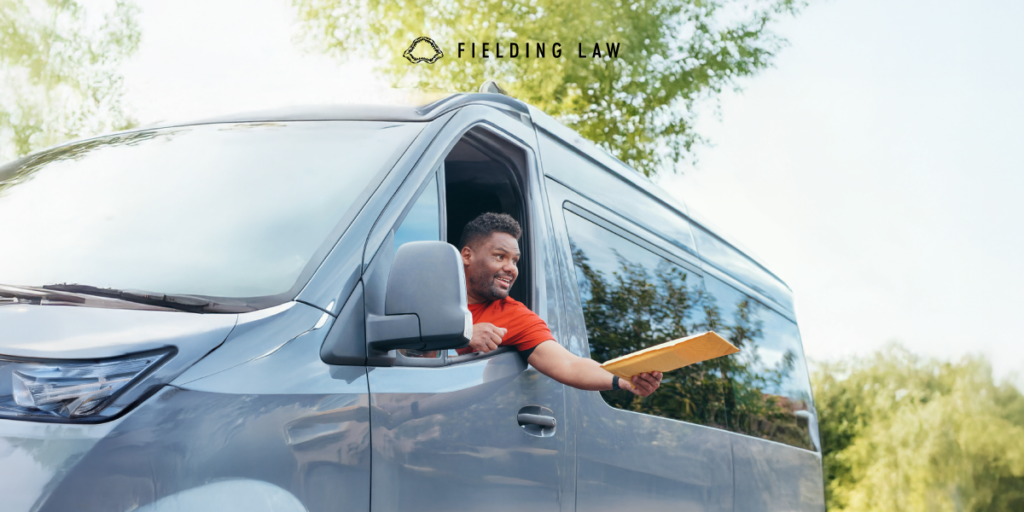 Delivery driver dropping off a package