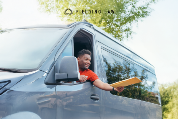 Delivery driver dropping off a package