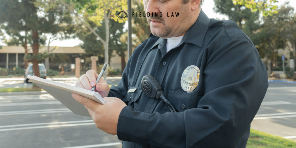 Police officer writing a report