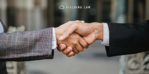 two people shaking hands