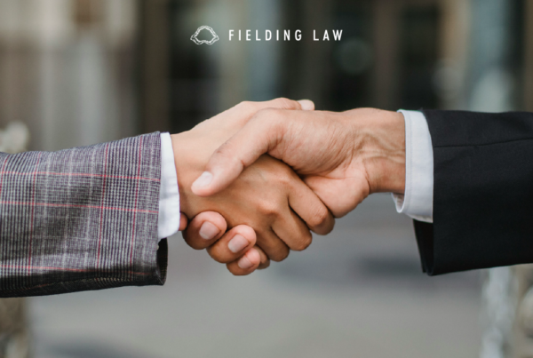 two people shaking hands