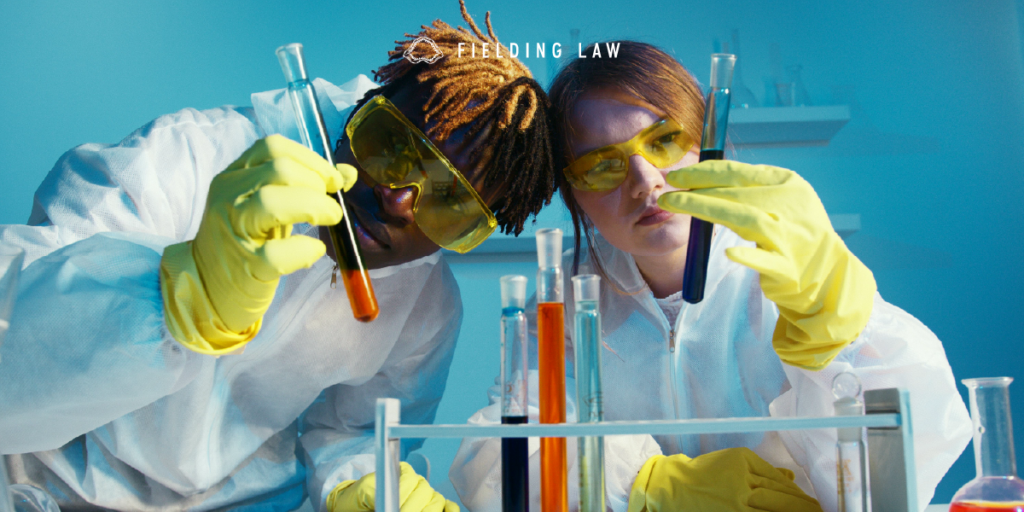 Students looking at test tubes in a laboratory