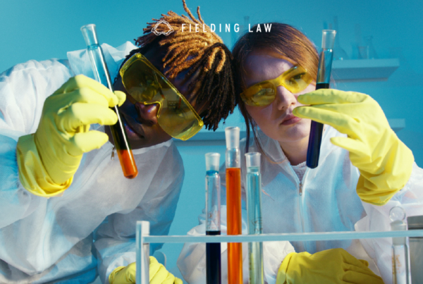 Students looking at test tubes in a laboratory