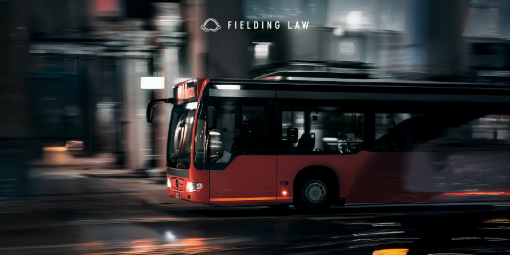 OCTA bus on the road at night time