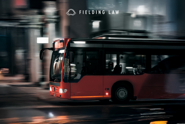OCTA bus on the road at night time