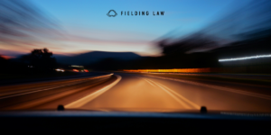 impaired vision driving. Roadway is blurry with surroundings having a motion blur