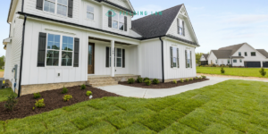 Personal home and Property with fresh grass laid. Another house in the distance