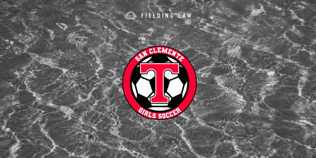 SCHS Girls Soccer logo over a water background