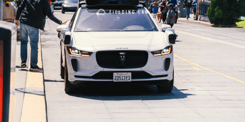 Waymo autonomous vehicle on a road