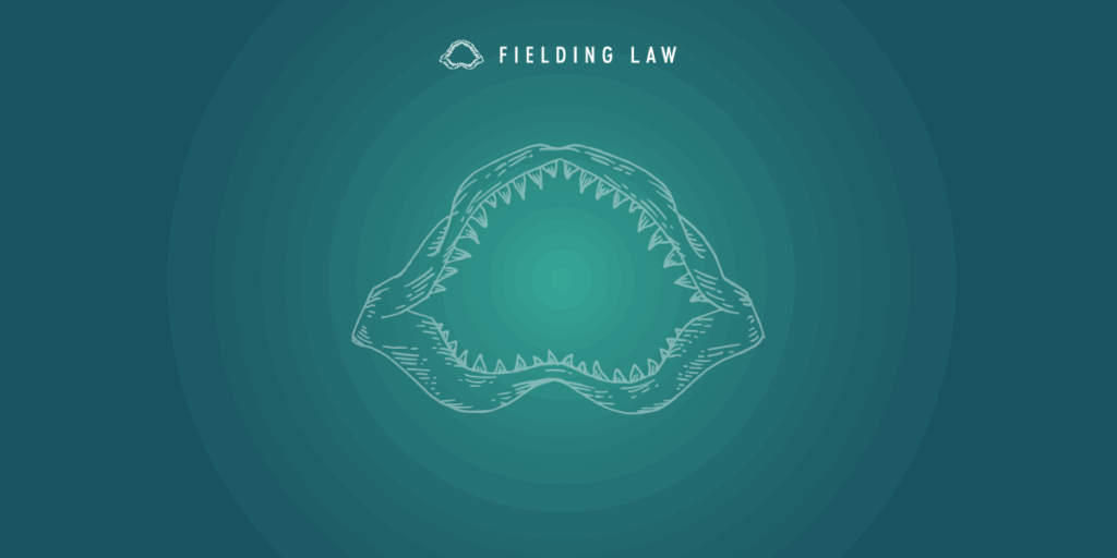 Fielding Law Jaw logo on blue and aqua green gradient