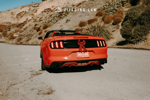 red car decorated for a christmas road trip