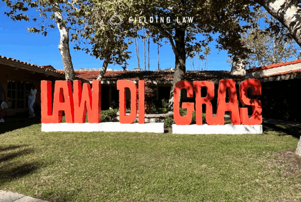Law-Di-Gras sign in a yard