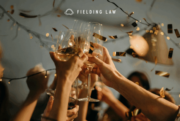 People Toasting Wine Glasses at a New Year's party