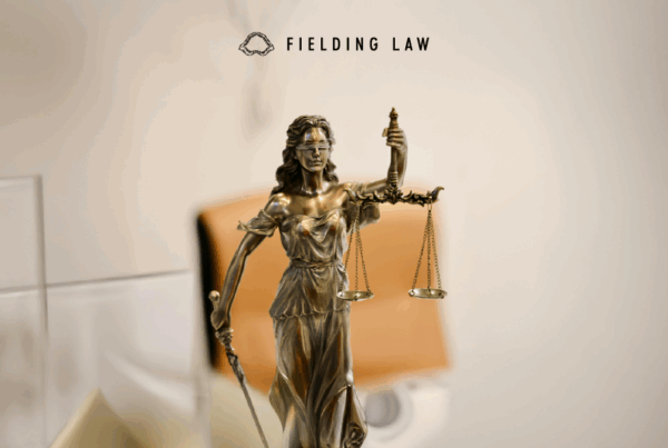lady justice statue on a desk