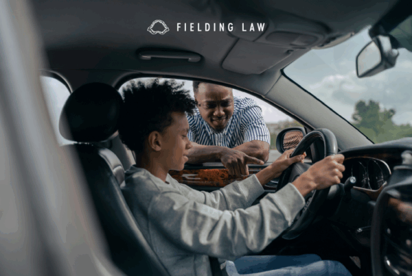 Student driver sitting in a car