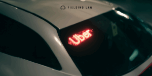 Uber lighted sign in a car window