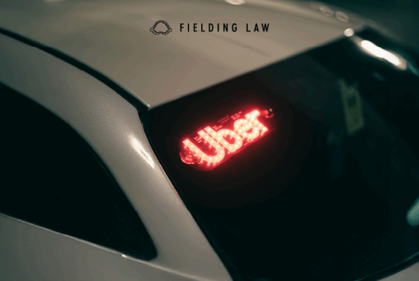 Uber lighted sign in a car window