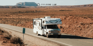 Travel adventure in an RV on Arizona road. Road rocks in the background