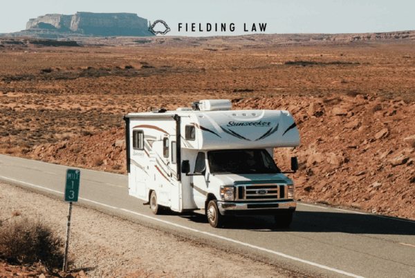 Travel adventure in an RV on Arizona road. Road rocks in the background