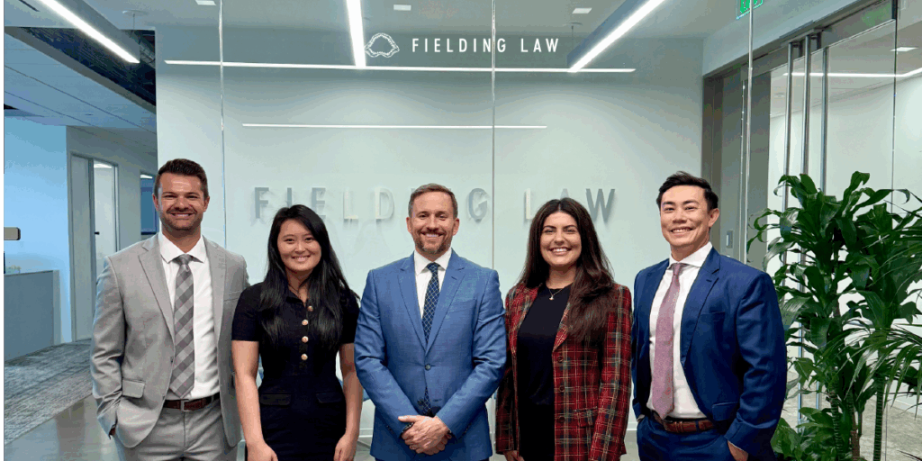 Fielding Law attorneys and Law clerk in the office