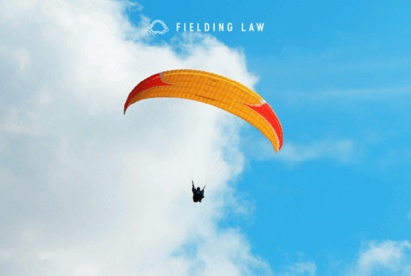 View of the sky with a person using a parachute