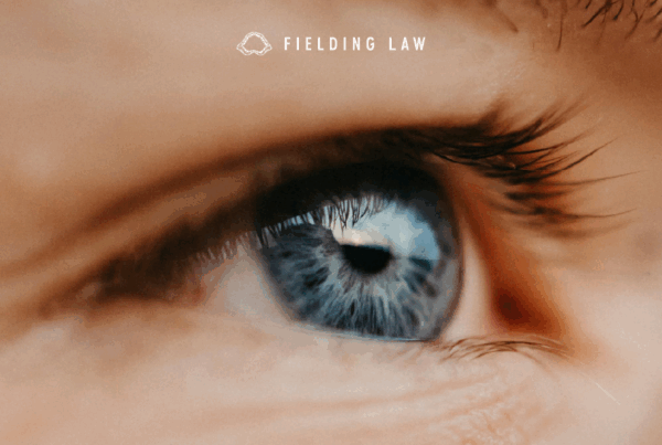 a close up of a persons blue eye