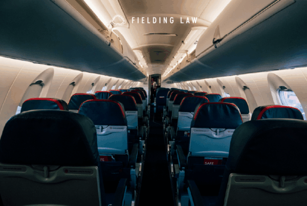 interior view of an airplane looking down the aisle