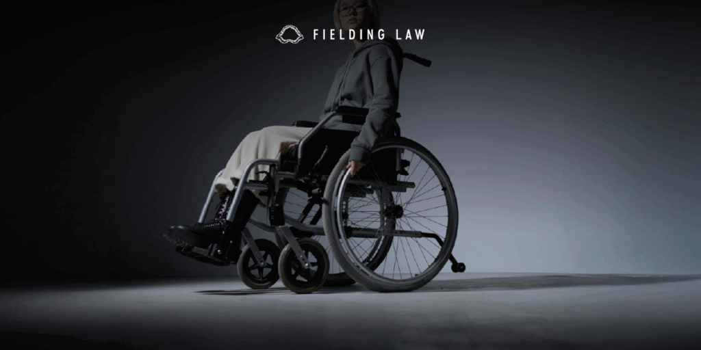 person with a disability sitting in a wheelchair