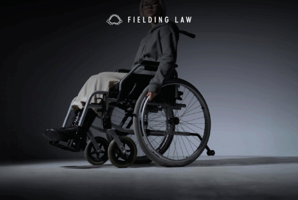 person with a disability sitting in a wheelchair