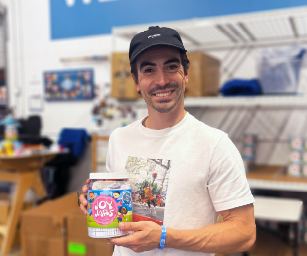 Daniel holding a joy jar